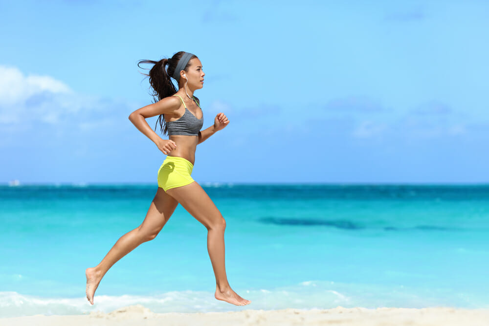 woman running on beach